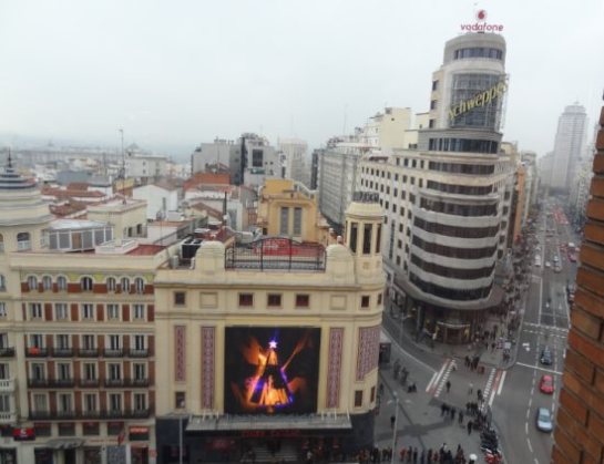 The Gran Vía as seen from the Corte Inglés in Callao, with the Capitol building (A on the map). The façade on the left defines the western Callao limit