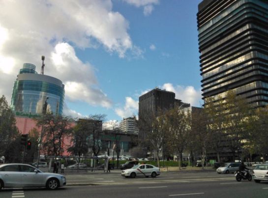 The southeast corner of Azca, a powerful public transport hub. On the right, BBVA building by Sainz de Oiza